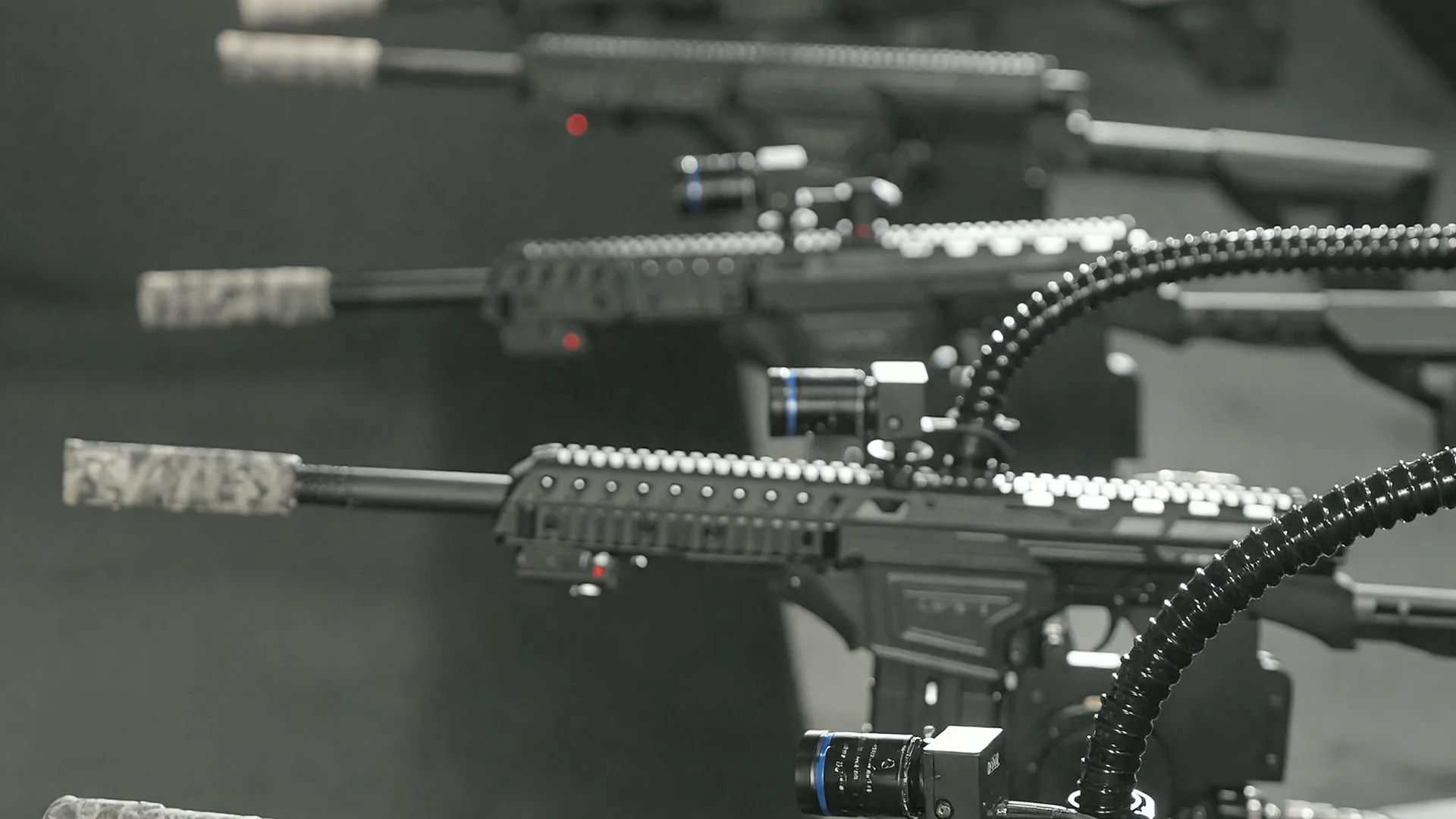 A row of SHOV’s real gun turrets on motorized mounts, with cameras and ammunition feeds